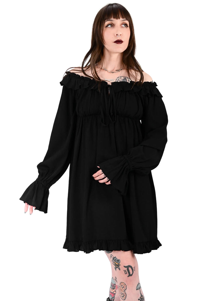 cute black dress with flared sleeves and ruffle trim from Foxblood