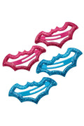 Two pink and two blue hair clips on a white background