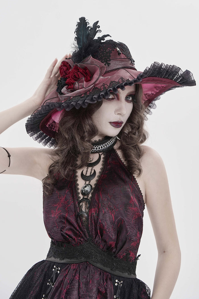 red and black floppy hat