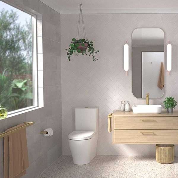Caroma Luna Tower Basin Mixer Brushed Brass bathroom at The Blue Space