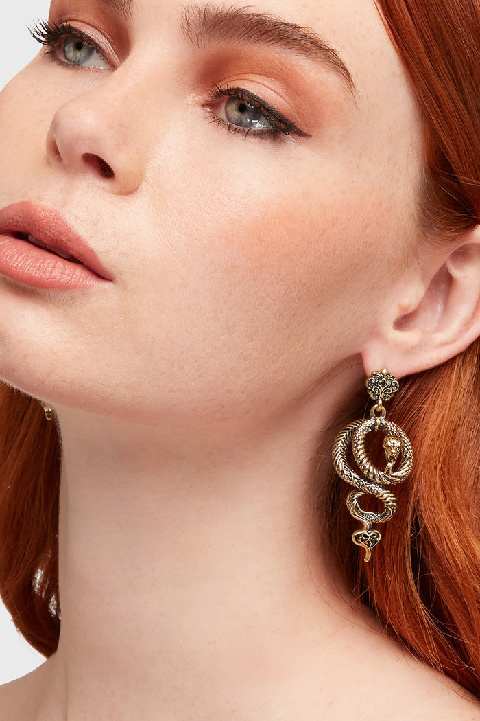 gold serpent dangle earrings