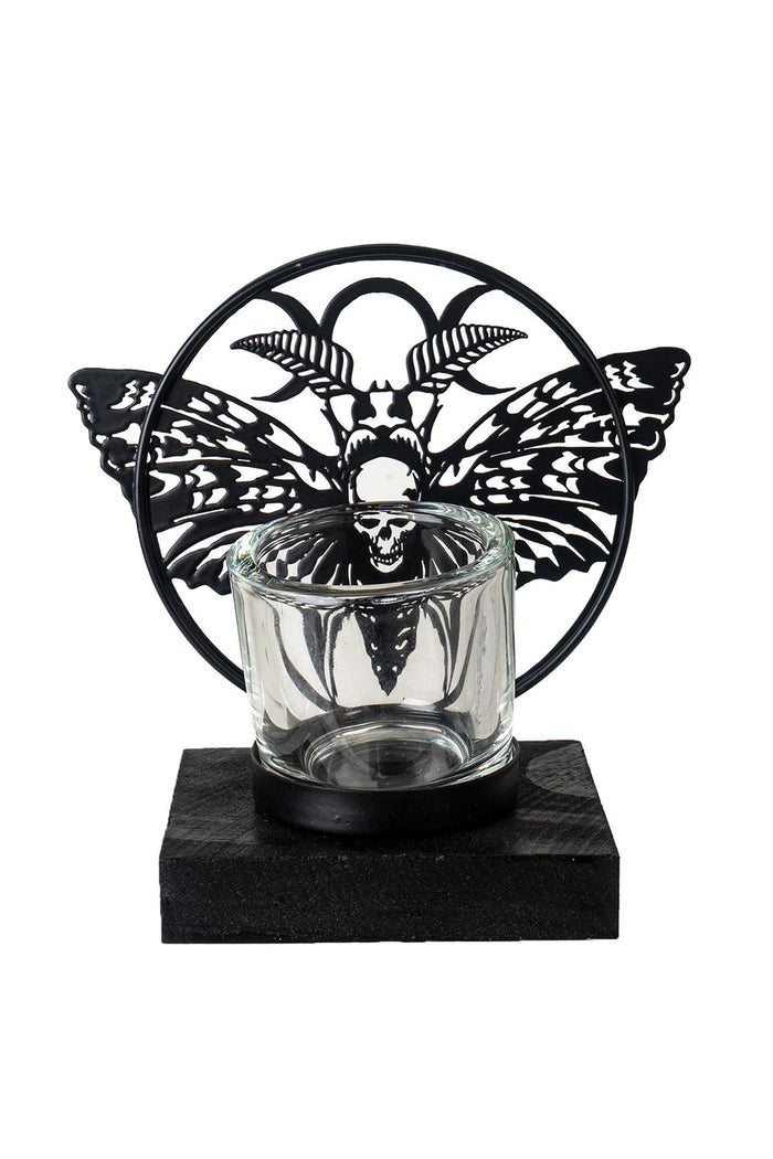 tea light candle holder with moth sculpture on the front made of metal