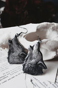 antique finish wolf earrings