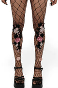 faux flower and leave attached to fishnet stockings