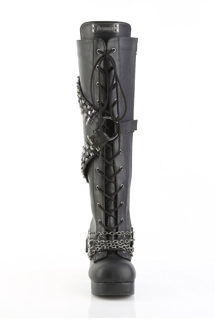 spiked platform boots with bullet straps and chains