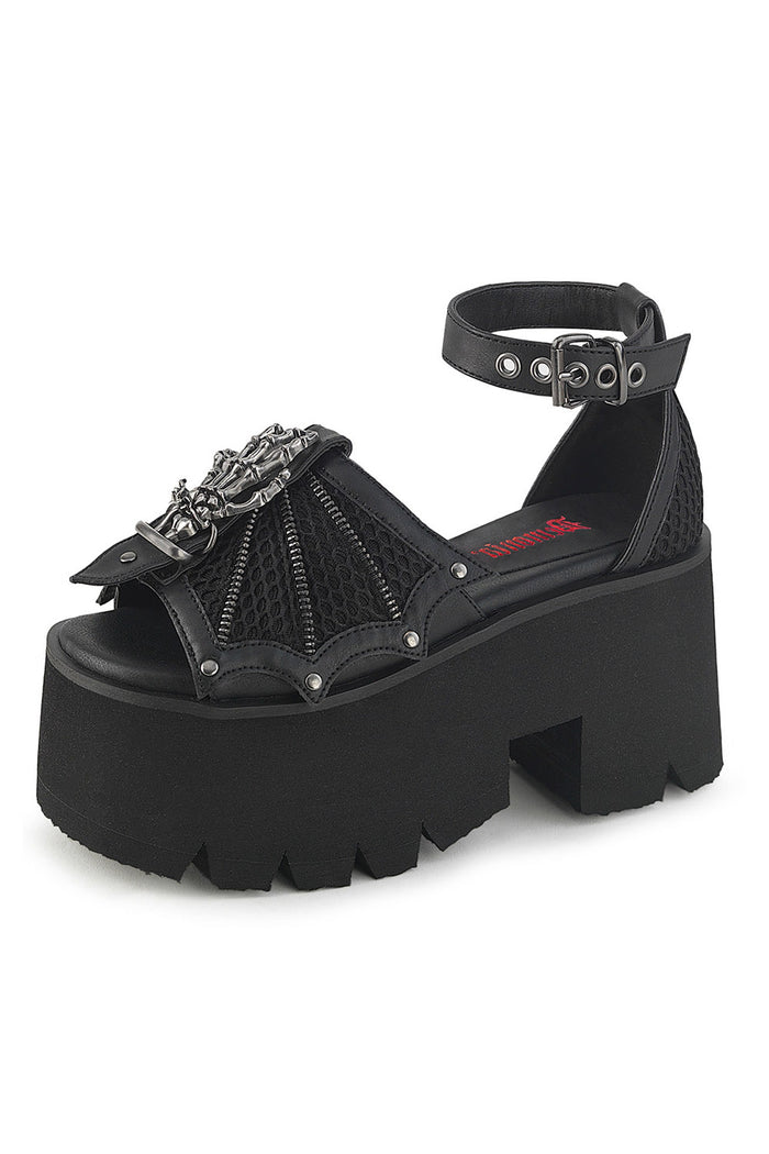 fishnet sandals with a chunky heel and skeleton charm by demonia