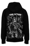 Black pullover hoodie shown from the back, featuring a large white graphic print of a skeletal figure with wings and the text 'HANG IN THERE' across the upper back.