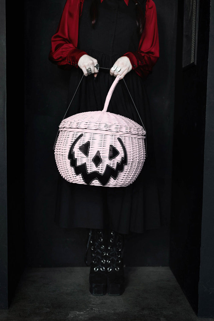 vintage goth inspired pumpkin jack-o-lantern wicker picnic basket with spiderweb interior lining