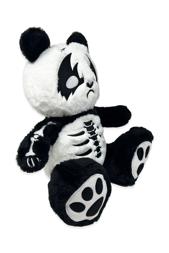 Plush panda bear with skeleton embroidery detail