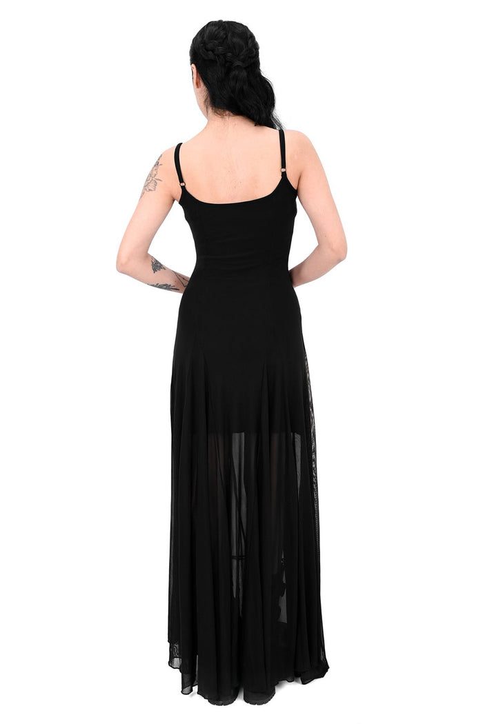 Black gown with sheer overlay on a white background