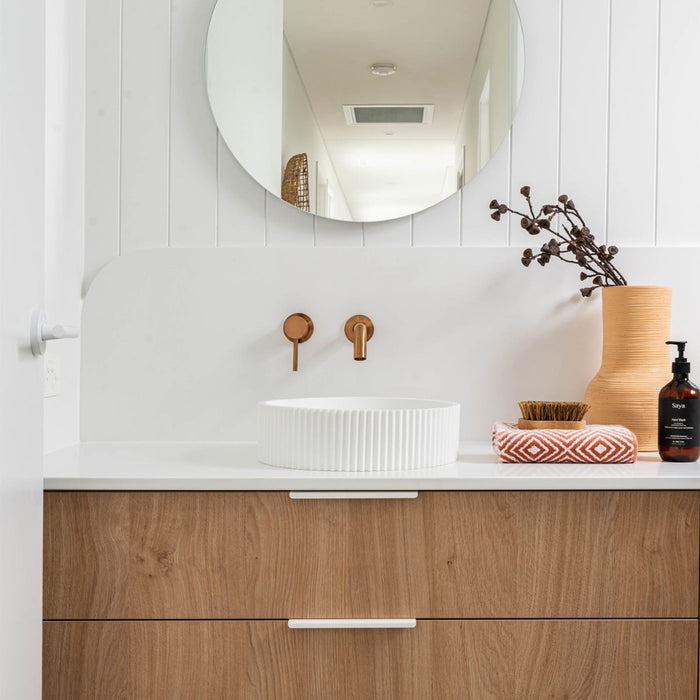 Momo Handles Ferrara Lip Pull in White featured in coastal bathroom - The Blue Space