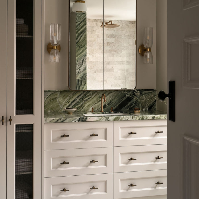 Momo Handles Belgravia T Knob in Bronze featured in luxurious bathroom with green marble - The Blue Space