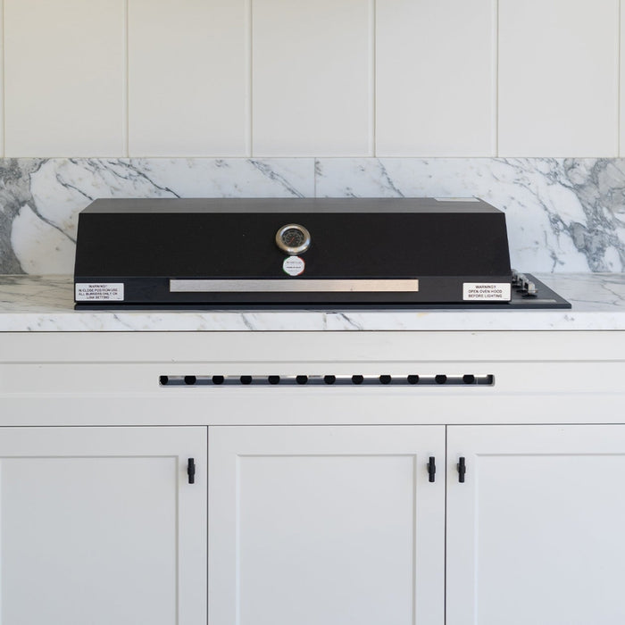 Momo Handles Maida T Knob in Black featured in Outdoor Kitchen - The Blue Space