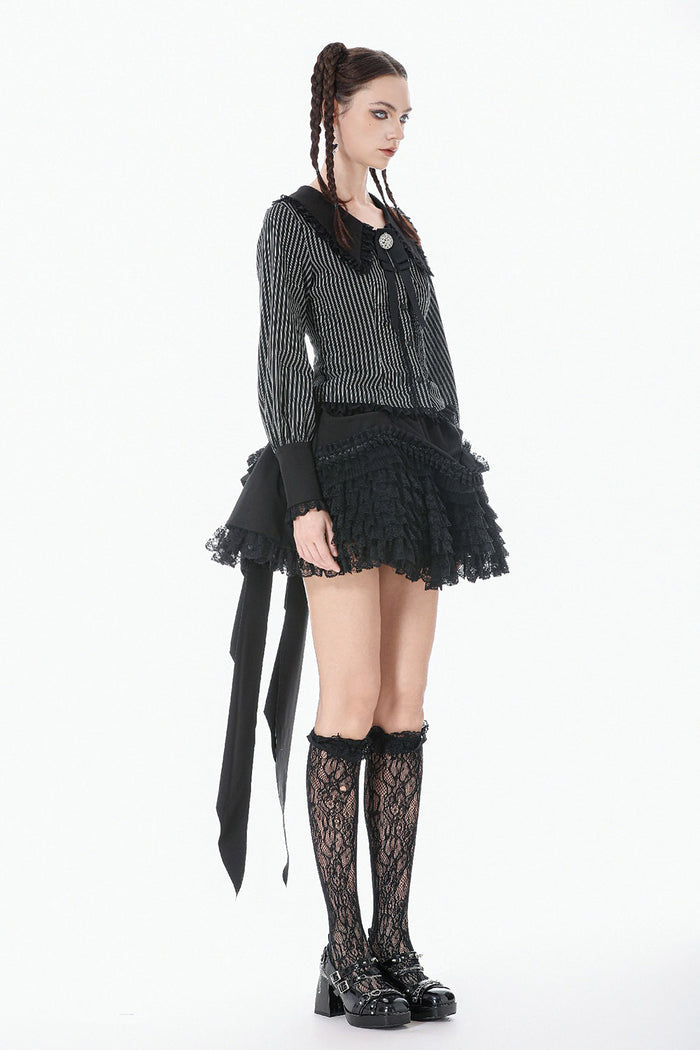gothic woman wearing a long sleeves womens striped blouse with puffed sleeves and black collar