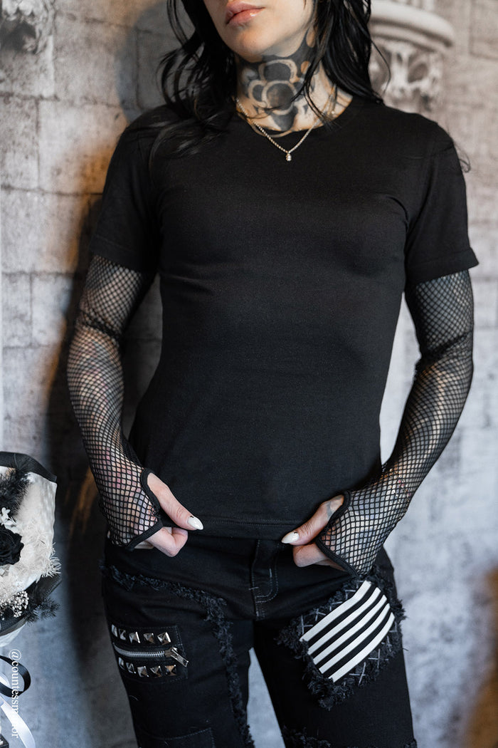 womesn emo fishnet long sleeve top and attached black shirt with thumbholes