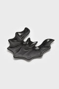 black ceramic bat-shaped spoon rest