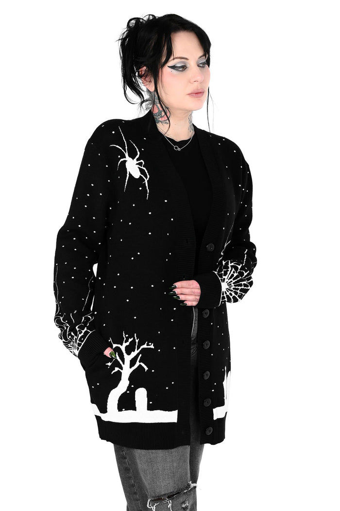 dark whimsical knitted halloween graveyard scene cardigan sweater