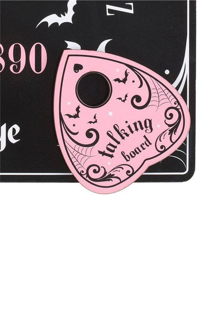 creepy cute pastel goth ouija board with heart planchette