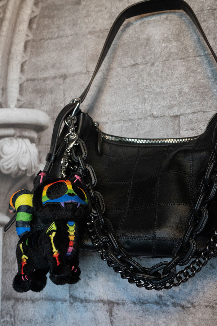 spooky cute gothic rainbow skeleton kitty cat plush keychain on a goth bag