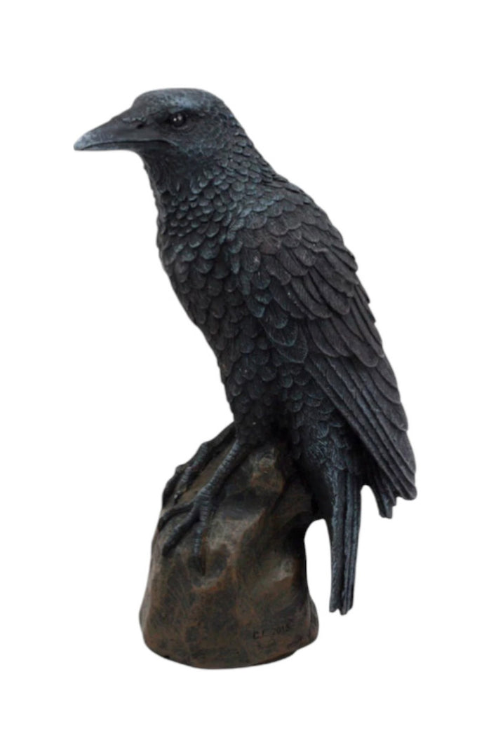 black crow bird on stand