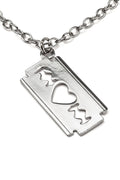 Silver razorblade-shaped pendant with heart and star cutouts on a chain against a white background