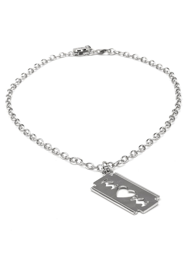Silver bracelet with a rectangular razor blade charm