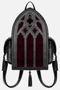 Gothic-style backpack with stained glass design on a gray background