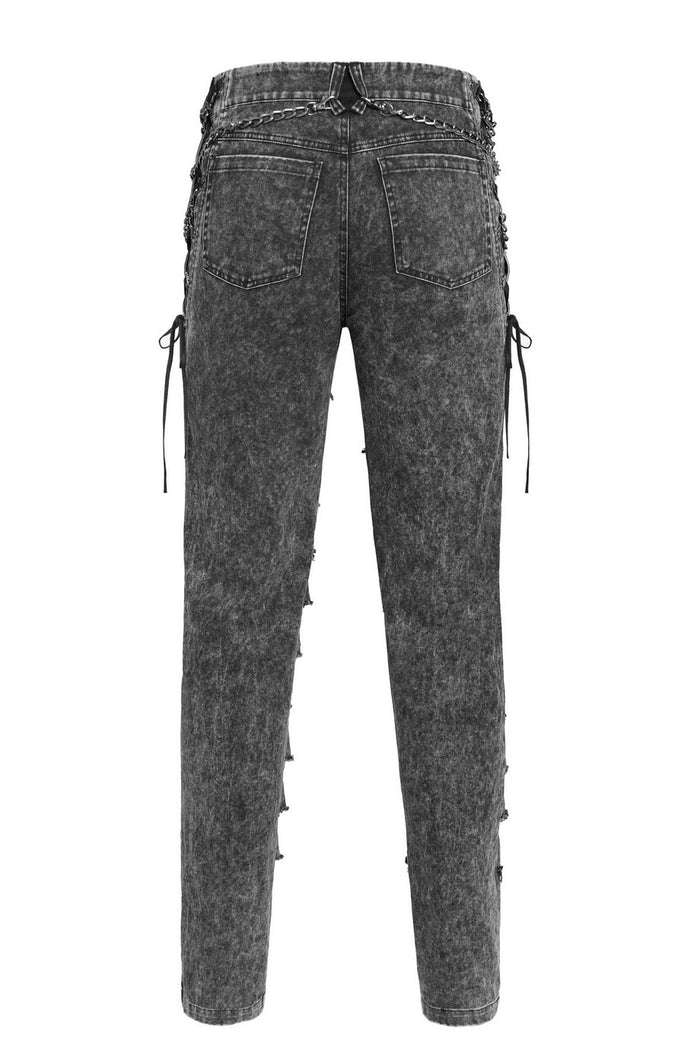 Black distressed jeans on a white background by devil fashion