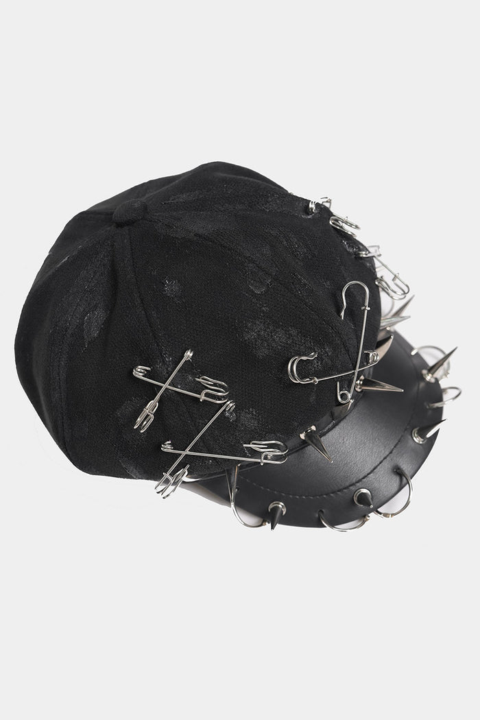 studded safety pin spiked vegan leather cap hat