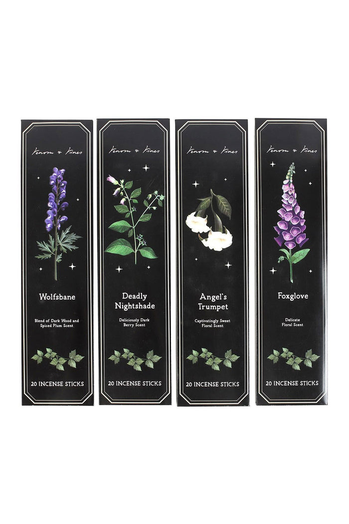 Four black incense boxes with botanical illustrations and names on a white background