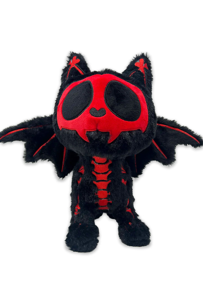 Black and red plush cat toy with bat wings on a white background