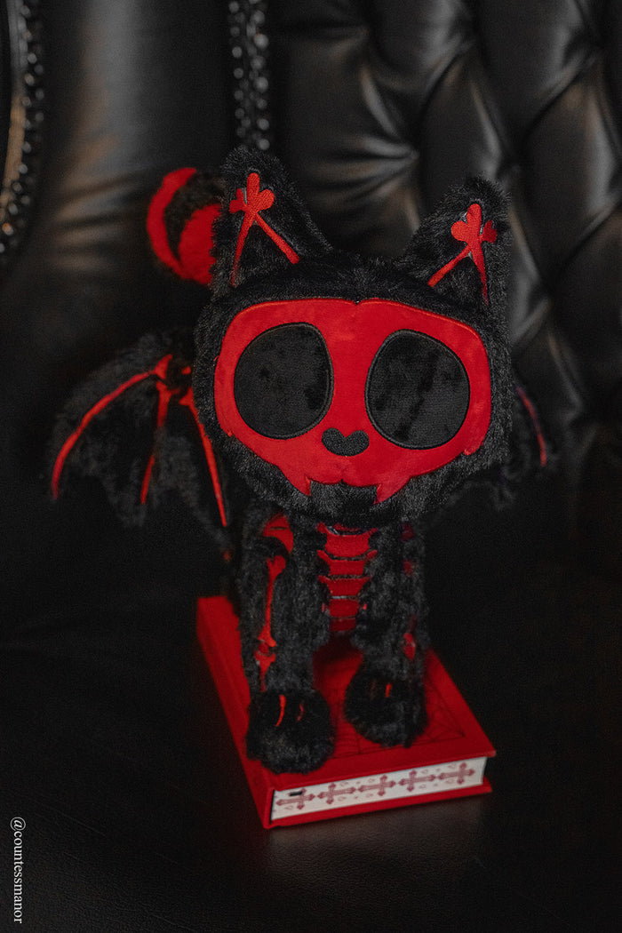 red and black vampire cat plush