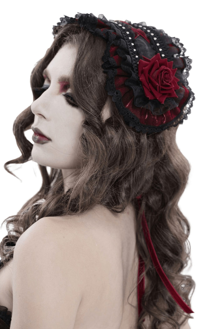 Woman wearing a black headband with red roses on a white background