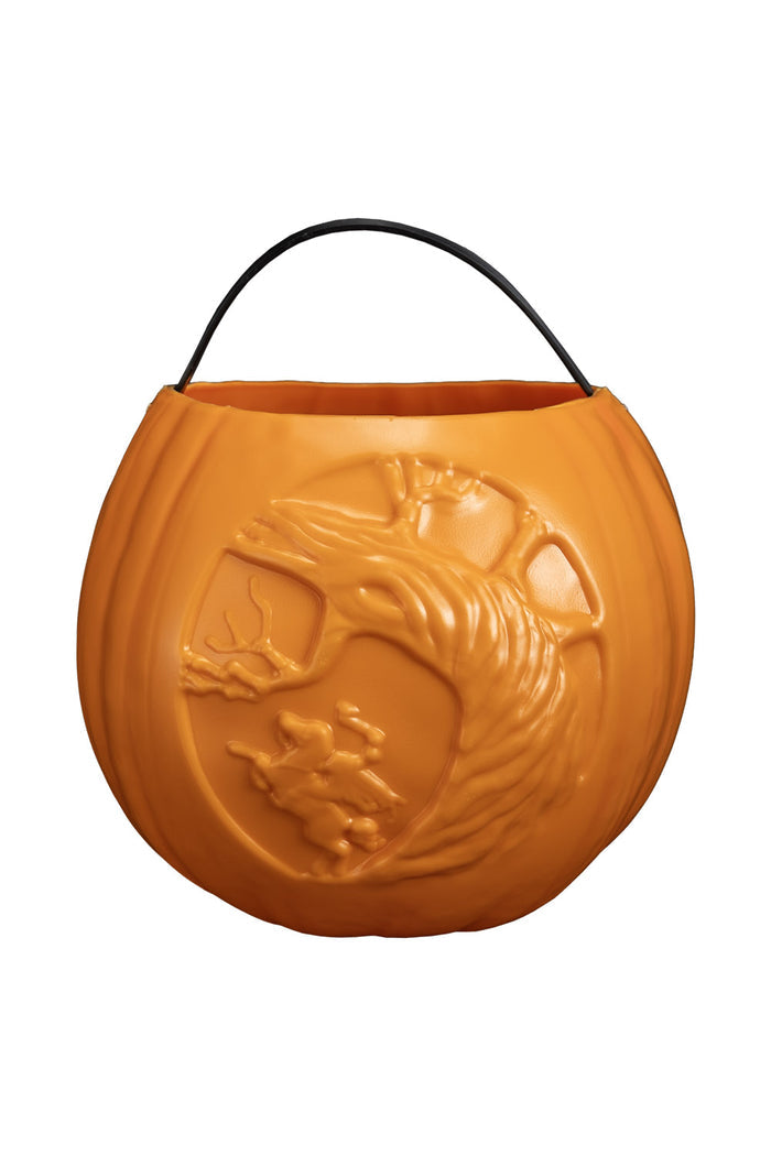 Pumpkin-shaped container with a handle on a white background