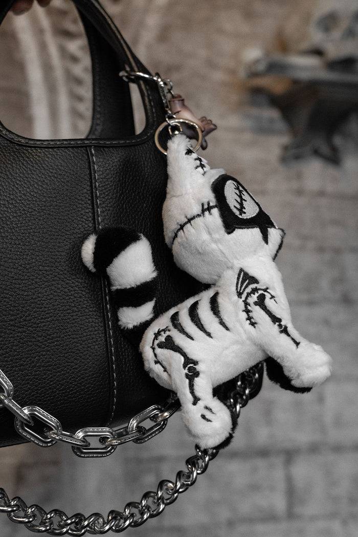stitched creepy cat plush keychain