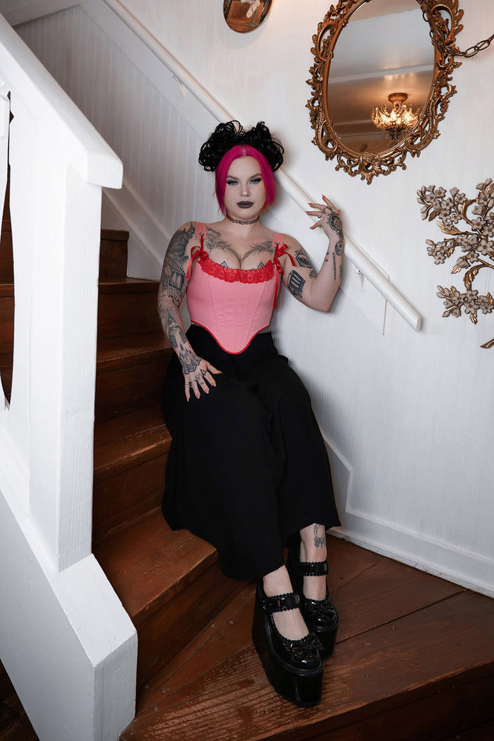 red and pink corset with ribbon straps
