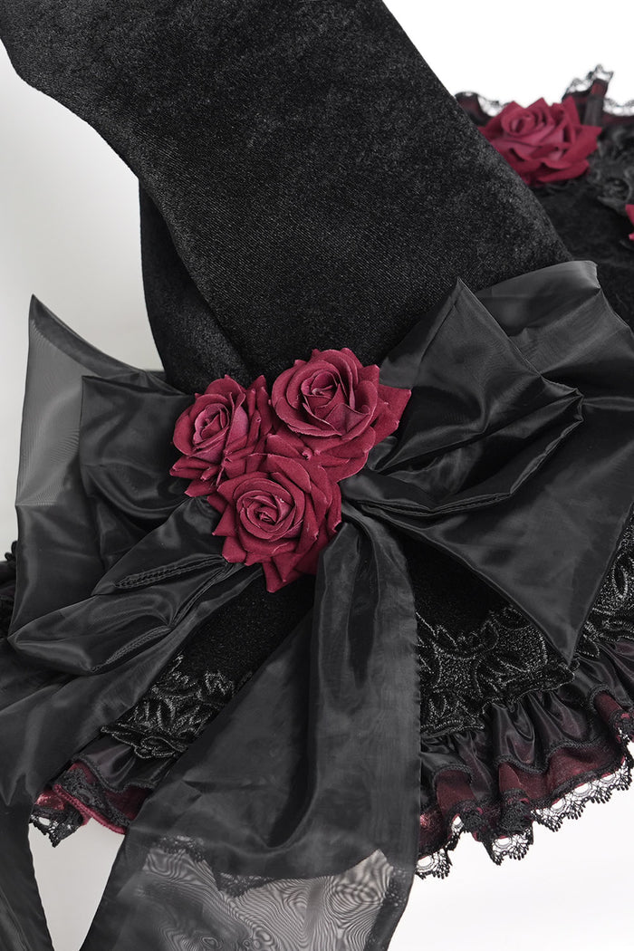 lace and ruffled wide brimmed witch hat with red roses