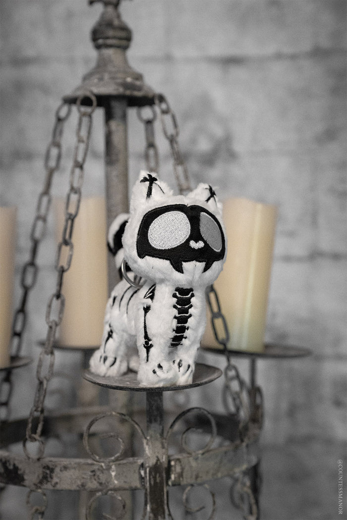 black and white skeleton furry plush cat keychain